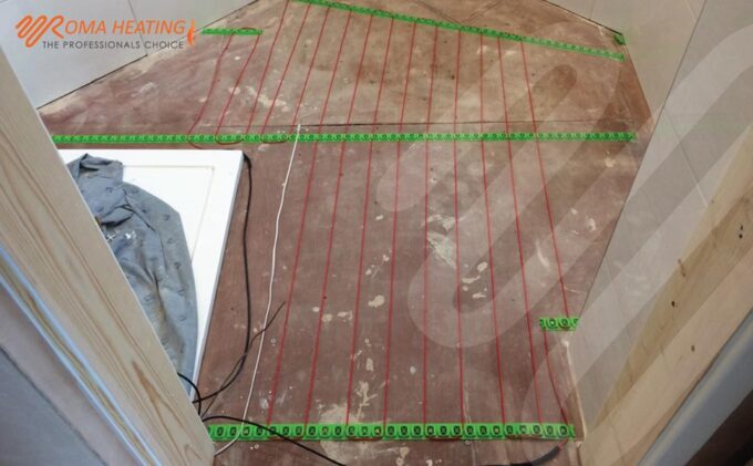 Underfloor Heating Cable Spacers on a Wooden floor